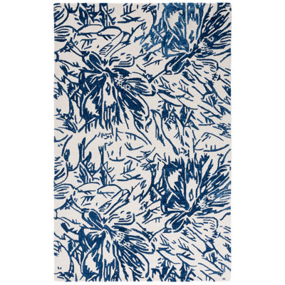 Tapis floral ivoire / bleu en laine / coton touffeté à la main Romon