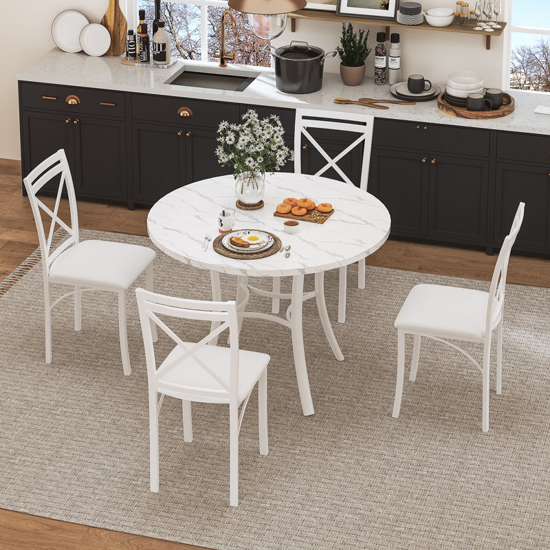 Ensemble de salle à manger à quatre pieds Kasandra pour 4 personnes, ensemble de table de salle à manger 5 pièces pour 4 personnes, table de cuisine ronde et 4 chaises de salle à manger en métal avec sièges en similicuir