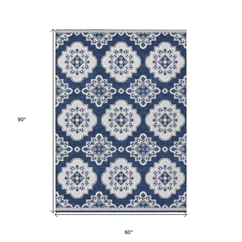 Tapis intérieur / extérieur 5 pi x 8 pi bleu marine et ivoire lavable