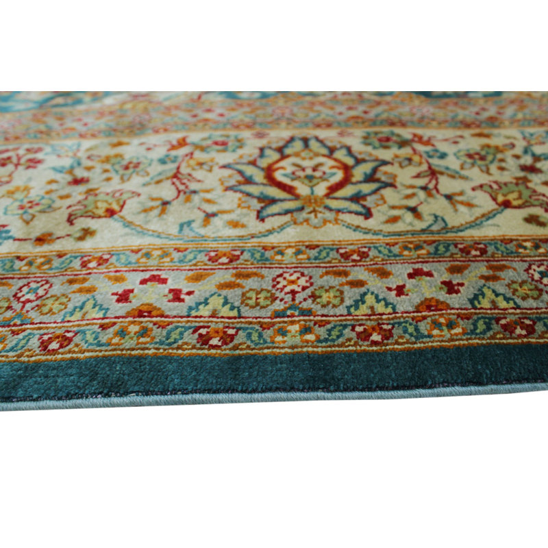 Tapis bleu sarcelle Gunnarr Faraja