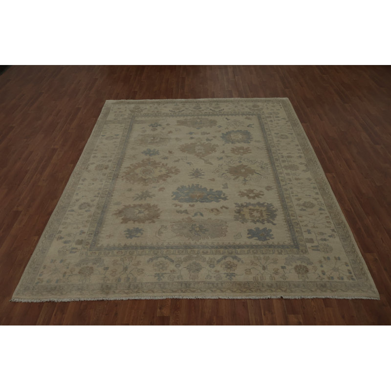 Le luxueux tapis Oushak 8 x 10 apporte de la chaleur à tout espace