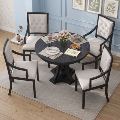 Ensemble de salle à manger rétro extensible rond de 5 pièces avec quatre fauteuils rembourrés