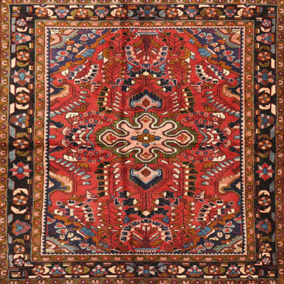 Tapis beige/rouge/noir traditionnel