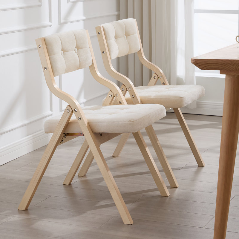 Chaise pliante au design élégant avec structure en bois massif et dossier et siège rembourrés capitonnés, Beige