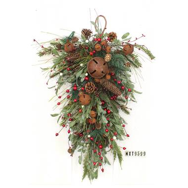 Christmas Wreath With Poinsettia and Peacock Ribbons