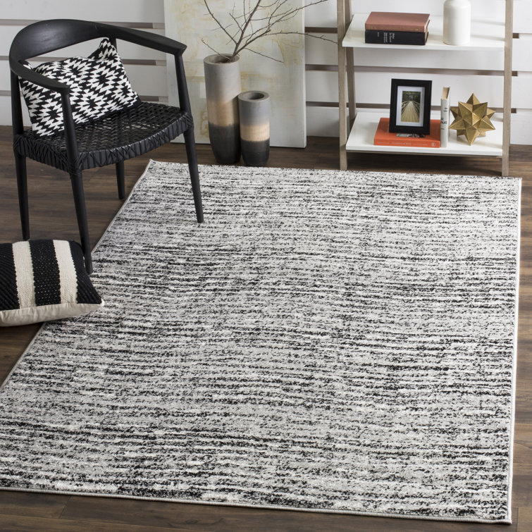 Riebe Abstract Black/Silver Area Rug