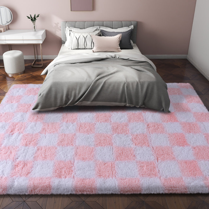 White and pink checkered indoor area rug, festive decor suitable for living rooms, studies, and children's rooms., Pink