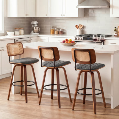 Tabouret pivotant rembourré en noyer avec structure en bois massif et en fer