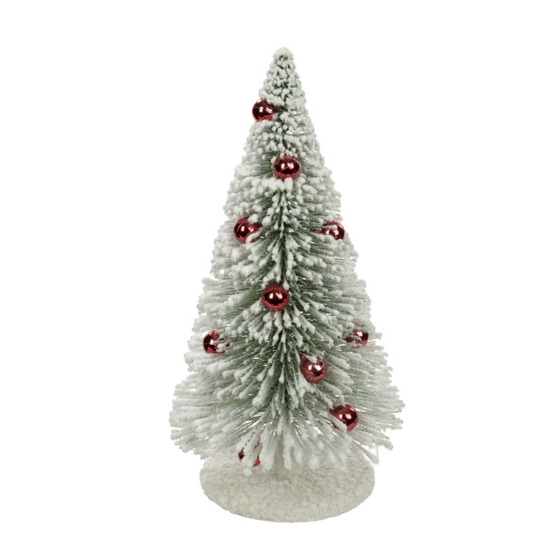 Faux arbre de Noël vert recouvert de neige