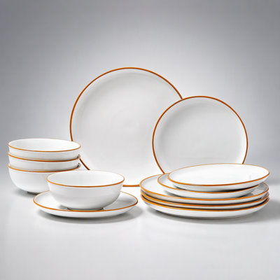 Service de table en céramique de 12 pièces avec assiettes et bols résistants, idéal pour les repas de tous les jours et les réunions de famille.