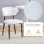 Table de salle à manger ronde moderne et minimaliste en bois brun avec des chaises ergonomiques blanches en PU-761342419