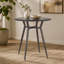 Table ronde en métal antique-898922530