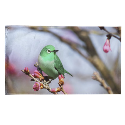 Serviette de thé à oiseaux sur une branche