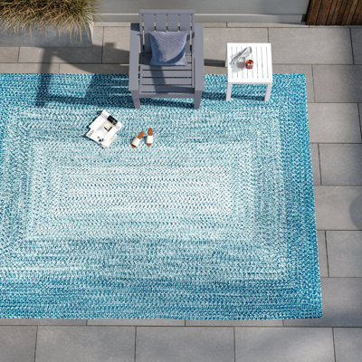 Tapis d'intérieur / extérieur bleu tressé Julianna