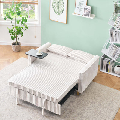 Le canapé en velours côtelé coulissant et à pousser avec double fonction, équipé d'un plateau de table mobile et de ports USB, convient aux salons et aux chambres à coucher