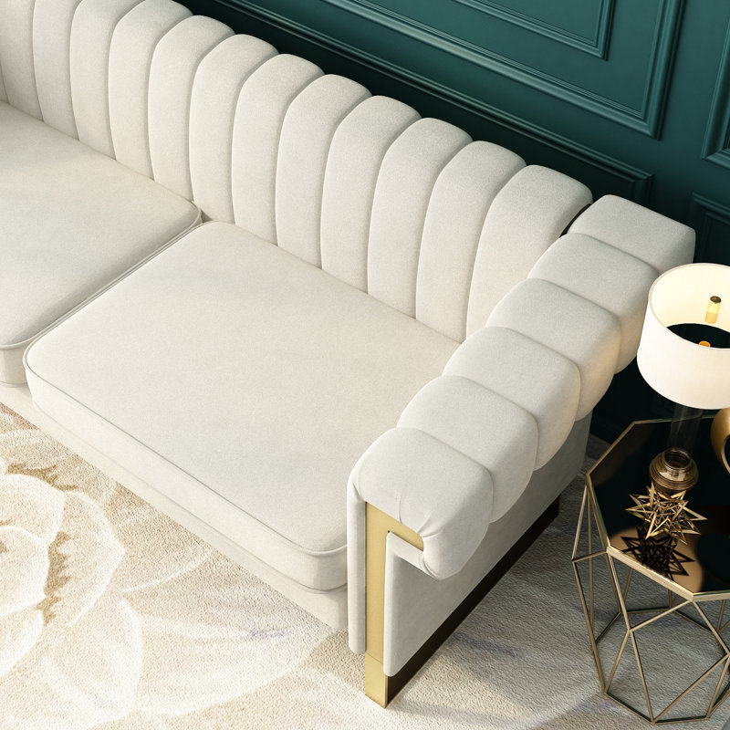 Canapé moderne en velours crème à 3 accents dorés pour un salon de style chambre à coucher doré
