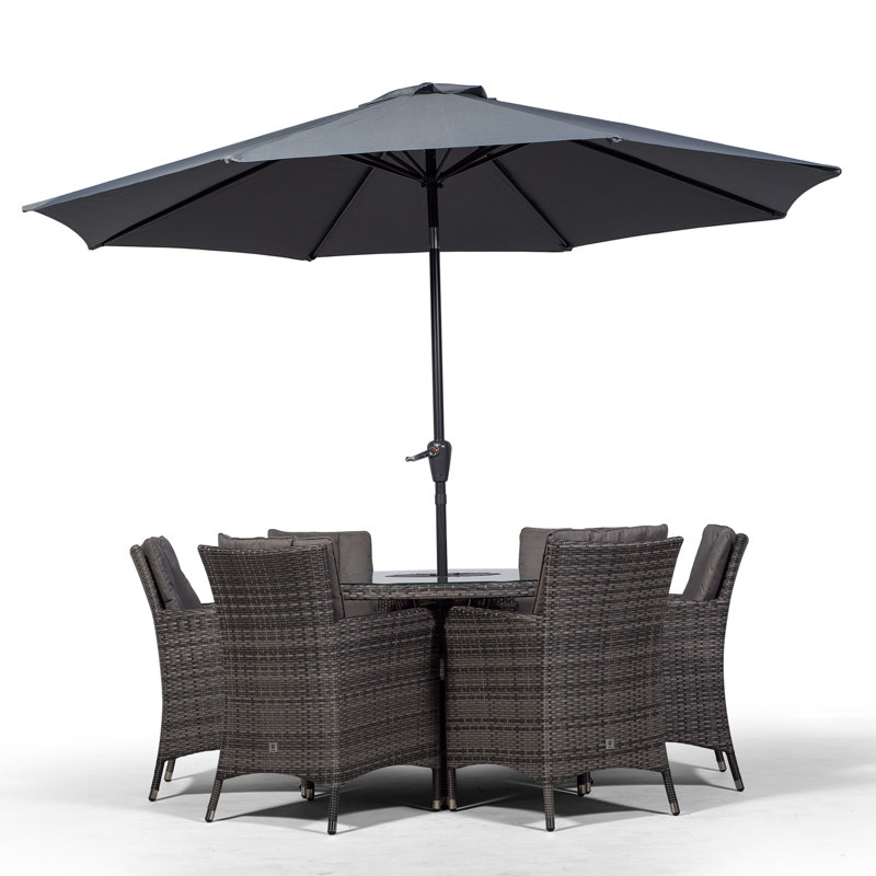 Karcher 6 - Person Wicker Patio Dining Set with Round Table , Cushions Included, Grey