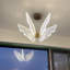Lustre papillon moderne avec lumière DEL
