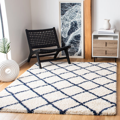 Tapis ivoire / bleu marine à motif géométrique Stanislaw