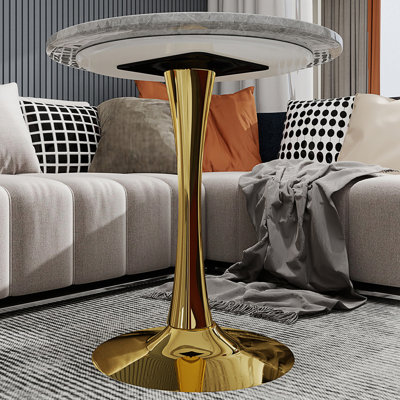 Table d'appoint ronde de style moderne minimaliste avec base piédestal effilée