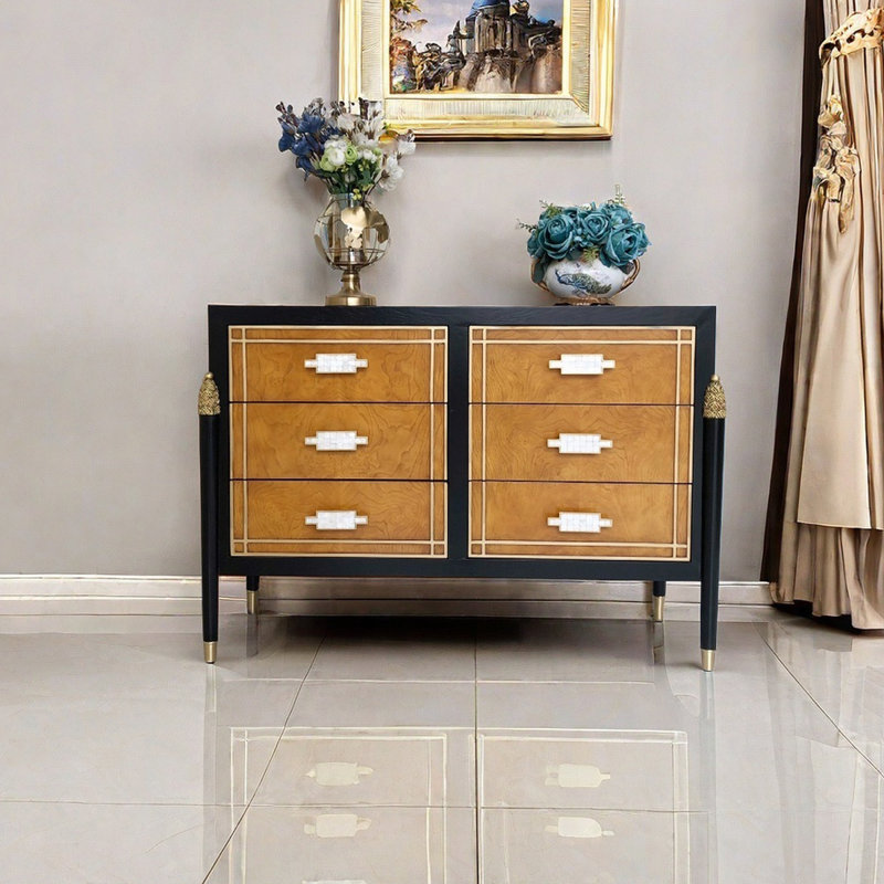 Modern sea shell handle drawer accent cabinet.