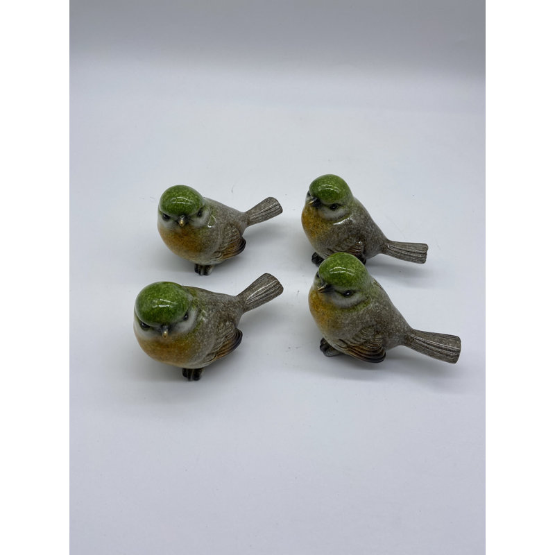 Ensemble de 4 petits oiseaux