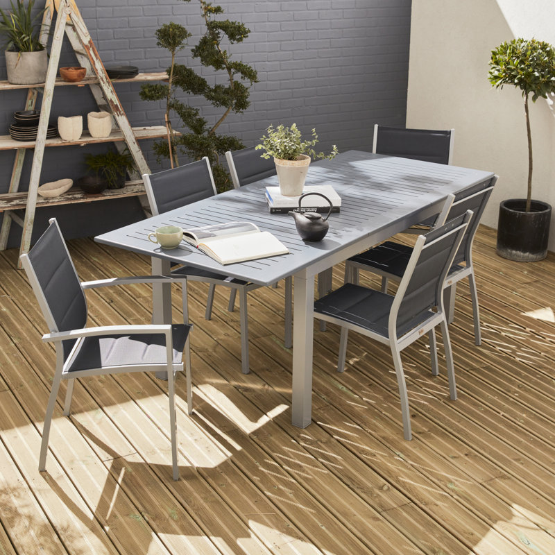 Alhan 6 - Person Patio Dining Set with Extendable Rectangular Table , Cushions Included