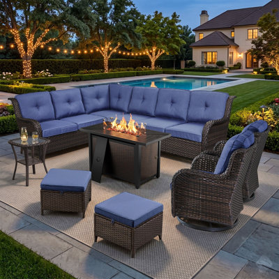 Ensemble de mobilier de jardin en résine tressée de 7 pièces avec table de foyer, idéal pour les réunions de famille.