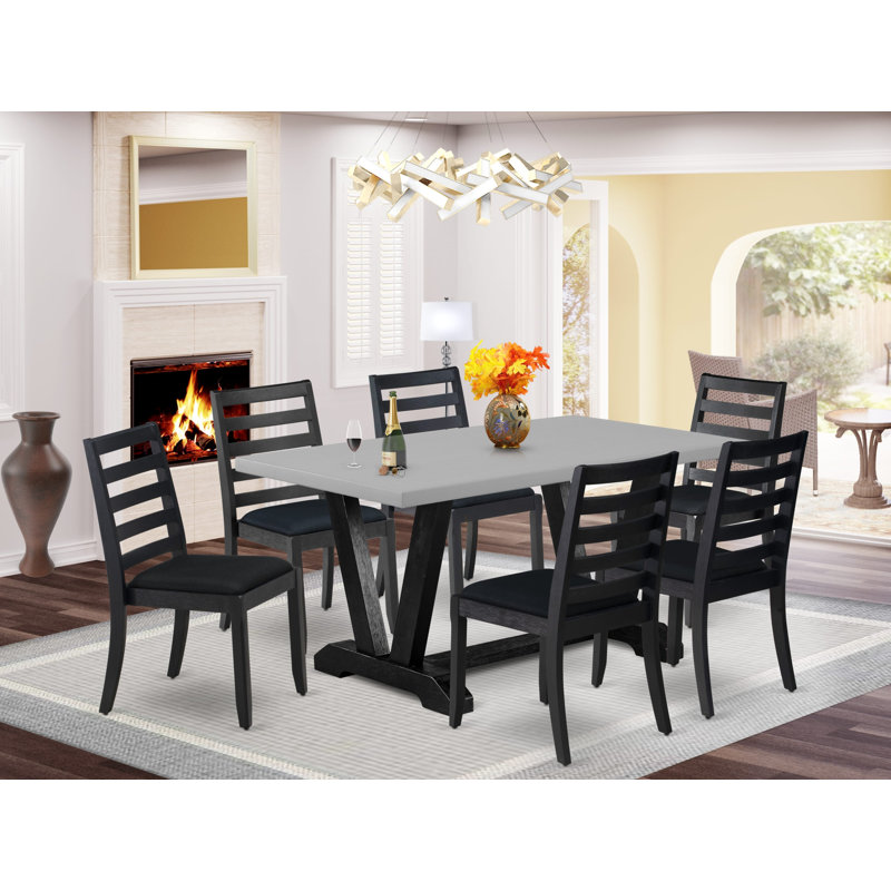 L'ensemble de table de cuisine 7 pièces se compose d'une table de cuisine rectangulaire et de 6 chaises empilables en tissu de polyester noir, finition noire brossée