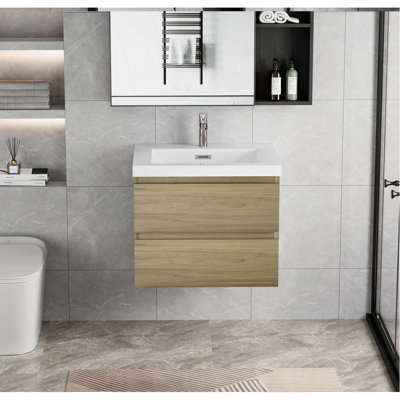Meuble-lavabo flottant avec lavabo, conception murale pour une décoration de salle de bain moderne et peu encombrante.