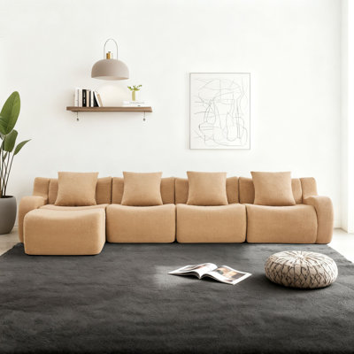 Canapé modulaire rembourré 4 places avec repose-pieds
