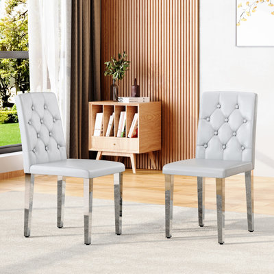 White PU Leather Dining Chairs Set of 2 with Ergonomic Buckle Backrest and Silver Metal Legs