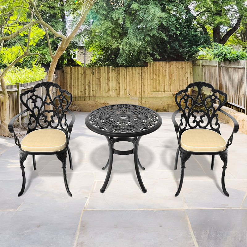 Jardin noir en fonte d'aluminium avec coussins de siège de couleur aléatoire et meubles de patio résilient