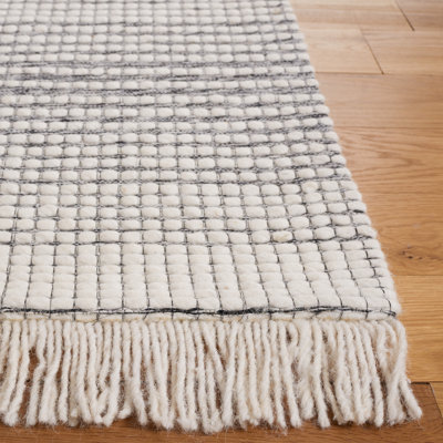 Tapis ivoire / noir en laine tissé à la main Marbella