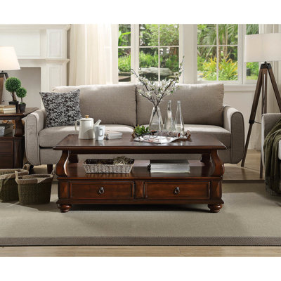 Table basse en noyer avec 4 tiroirs et 1 tablette, rehaussant la fonctionnalité de la pièce 4 tables, ajoutant du caractère à votre salon