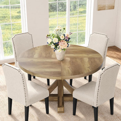Table de salle à manger ronde de style campagnard de 119 cm (47 po) pour 4 personnes, piètement en fer en forme d'étoile, plateau en bois imitation bois résistant à l'eau, structure métallique peu encombrante.