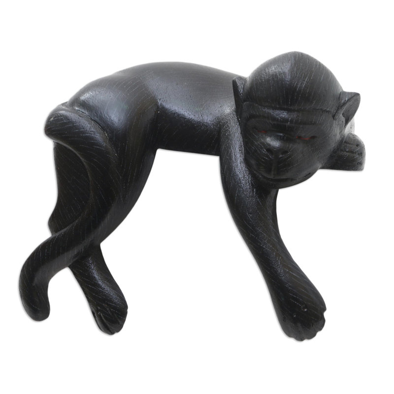 Sculpture de singe endormi