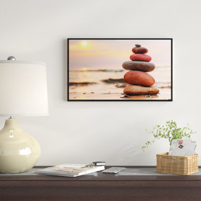 " Stones Pyramid On Sand Symbolizing Zen "