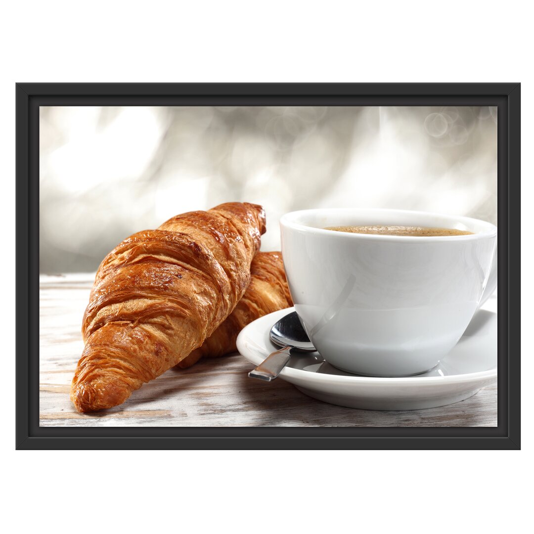 Gerahmtes Wandbild Frisches Croissant und Kaffee