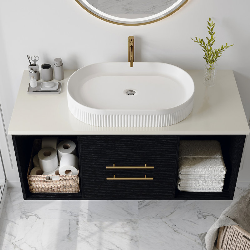 Meuble-lavabo en céramique blanc de 22,8 po avec lavabo vasque ovale et corps à rayures verticales, drain escamotable central