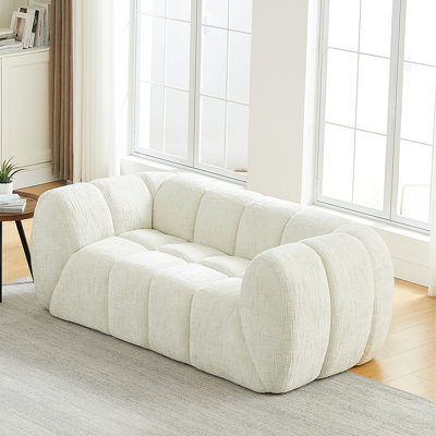 Causeuse en chenille avec coussin moelleux