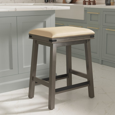 Tabouret de comptoir de 24 po gris vieilli avec assise en cuir français doux - procurant confort et style Une texture élégante ajoute une touche à votre cuisine