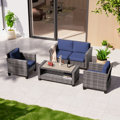 Ensemble de conversation pour patio 4 pièces avec causeuse et table basse