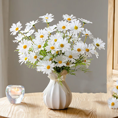Arrangement de marguerites dans un vase