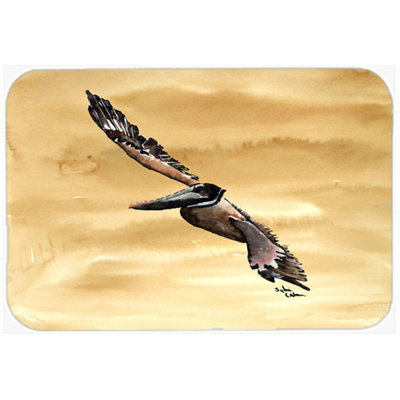 Caroline's Treasures Flying Pelican on Sandy Beach Glass Cutting Board