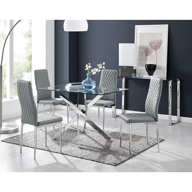 Lenworth Chrome and Glass Rectangular Dining Table Set with 4 Quilted Faux Leather Chairs