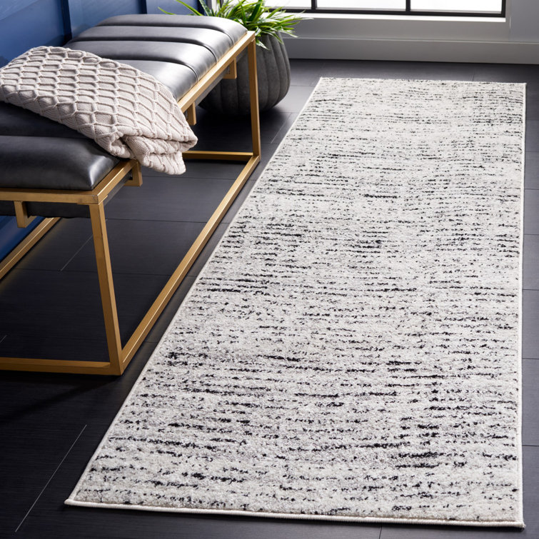 Riebe Abstract Ivory/Silver Area Rug