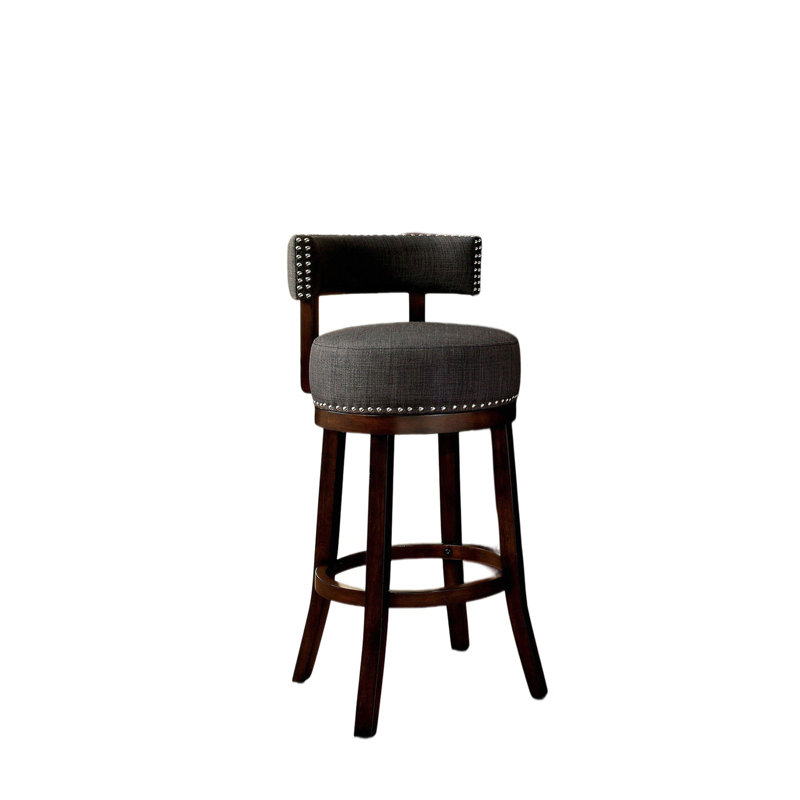 Chaises de bar 2 pièces 25 po soutenues par de riches pieds en bois foncé. Les sièges et les dossiers rembourrés en tissu offrent une assise confortable