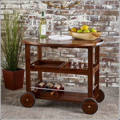 Chariot-bar réglable avec plateaux amovibles et rangement pour le vin, parfait pour les réceptions intérieures et extérieures.