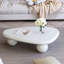 Table basse blanc crème avec 3 pieds